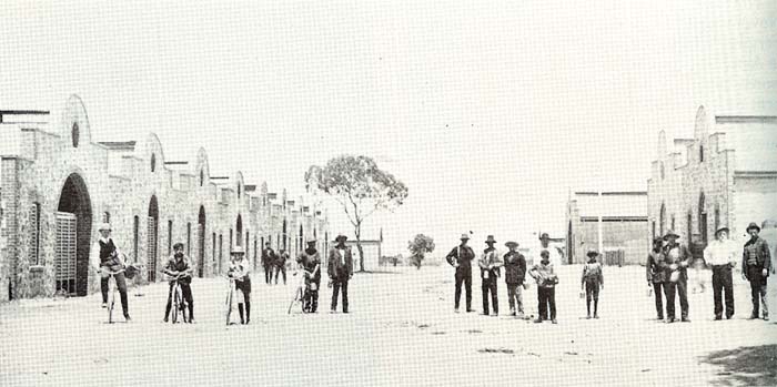 Clarence H Smith's implement factory (left) with power house at right. 1907